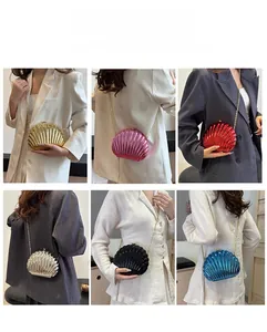 Chic shell-shaped chain bag in multiple colors showing versatile carrying options