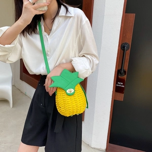 Handmade pineapple straw crossbody bag for summer with green leaf flap and golden lock