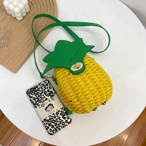 Creative pineapple woven crossbody bag with green leaf flap and gold metal twist lock