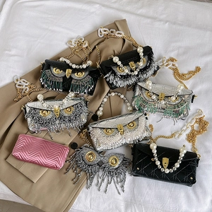 Collection of quilted leather crossbody bags with pearl handles and fringe tassel evening purses