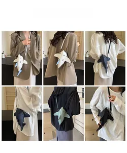 Detailed views of creative shark shaped crossbody bags on model in four colors