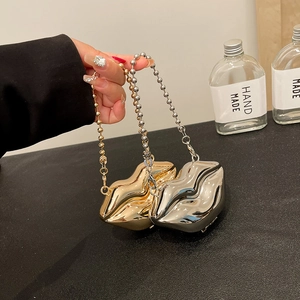 Chic lip-shaped acrylic clutch bags in gold and silver mirror finish with bead chains