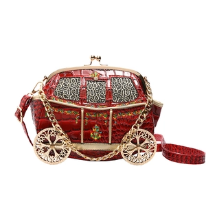 Creative red car-shaped handbag with crocodile texture and gold-tone chain strap