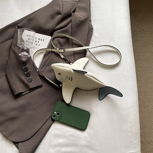 Creative shark-shaped crossbody bag in cream white and grey with adjustable shoulder strap