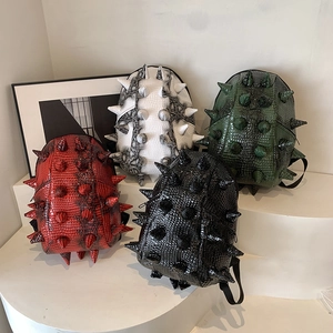 Punk style spiky backpack with 3D studs and embossed crocodile leather texture