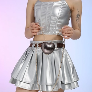 Unique apple-shaped metallic crossbody bag with gold chain and gunmetal mirror finish