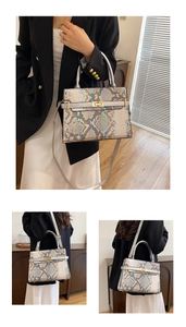 Detailed view of colorful python texture faux leather tote bag with silver handle