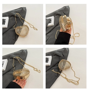 Detailed views of heart-shaped hollow gold metal clutch with woven mesh and chain strap