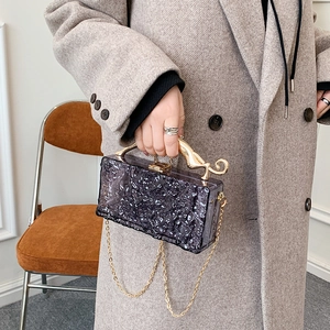 Purple acrylic evening clutch bag with ice-crack texture and golden leopard handle