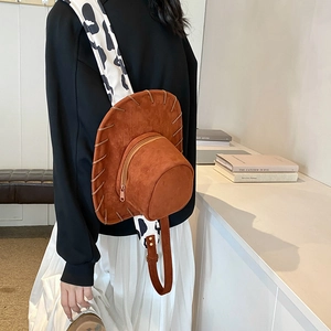 Retro brown suede cowboy hat shaped crossbody bag with stylish cow print wide strap
