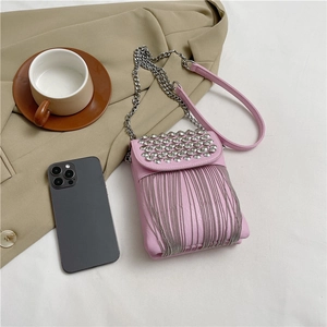Pink rivet crossbody bag with silver fringe chain and stylish shoulder strap