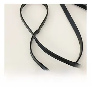 Close-up of black leather strap showing high-quality stitching and smooth texture