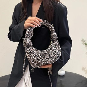 Fashionable leopard print braided rope hobo bag with unique decorative knots and hobo shape