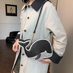Cute dolphin shaped crossbody bag with black faux leather and silver sequins design