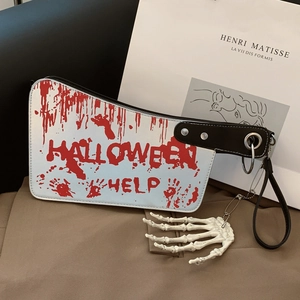 Halloween meat cleaver handbag with blood splatter design and skeleton hand charm