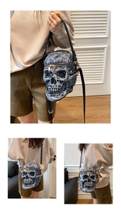 Detailed close-up of 3D skull bag with vintage cracked texture and gold dual zippers