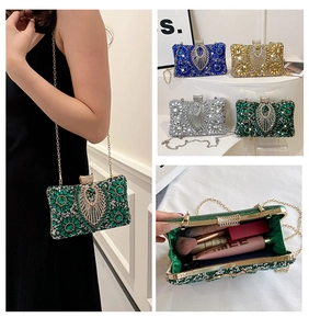 Close-up of sparkling rhinestone evening bags in emerald, blue, gold and silver finishes