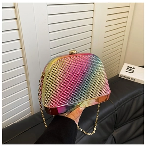 Detail of rainbow gradient evening bag with metallic woven texture and gold chain strap