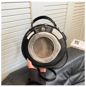 Detail of creative washing machine round bag with transparent window and control panel text