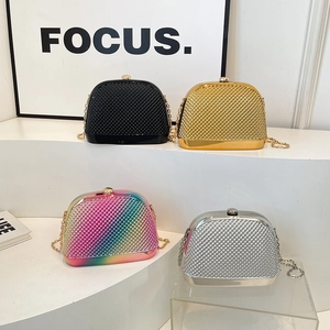 Fashionable shell-shaped evening bags in multiple colors with acrylic chain straps