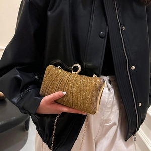 Sparkly gold glitter evening clutch bag with rhinestone ring clasp and metal chain strap