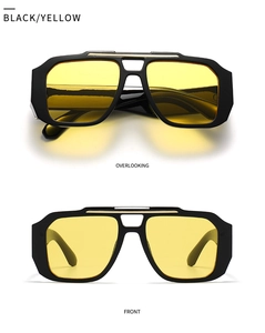 Detailansicht der Retro-Pilotenbrille mit schwarzen dicken Rahmen und gelben Klarsichtgläsern