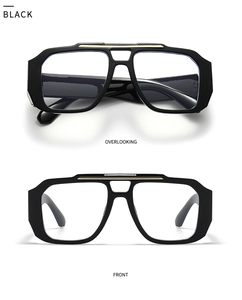 Schwarze Oversize-Sonnenbrille mit goldener Metallleiste, Front- und Draufsicht
