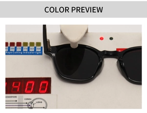 Polarized round sunglasses undergoing UV protection test with rays cutting indicator