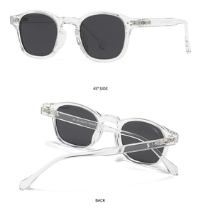 Detail of round polarized sunglasses with transparent frames and silver metal hinges