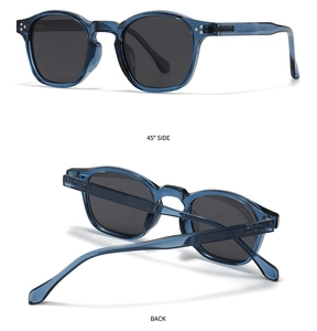 Detail view of transparent blue round polarized sunglasses with silver rivets at 45 degree angle