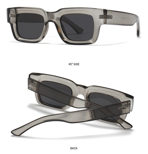 Detail view of square polarized sunglasses with gray translucent frames and black lenses