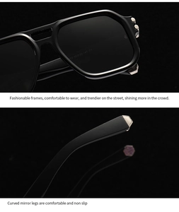 Detailed view of black geometric frame sunglasses with silver accents and gray UV lenses