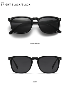 Detailed front and top views of black polarized sunglasses with silver metal rivets