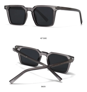 Detail view of square translucent gray polarized sunglasses with embossed temple patterns