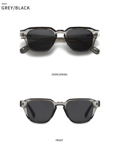 Close-up view showing grey translucent polygon frames and dark black polarized lenses