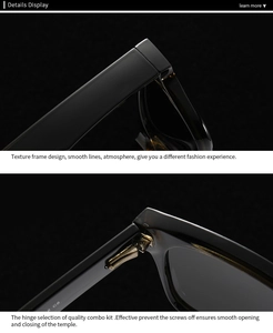 Détail de la branche de lunettes noire avec charnière en métal doré et numéro de série