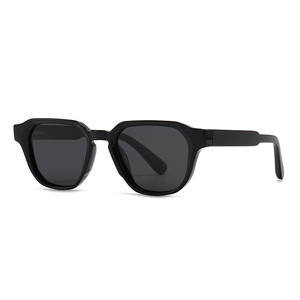 Neutral black polarized sunglasses with wide geometric frame and dark grey lenses