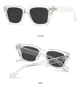Detail view of transparent sunglasses frames with metal rivets and CE safety markings