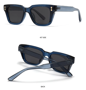 Detail view of blue transparent frame sunglasses with gold bone rivets and 45 degree angle
