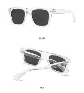 Detail view of transparent square sunglasses with specifications on the inner temple arm