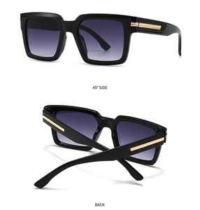 Detail of square sunglasses showing 45-degree side and back view with gold metal trim