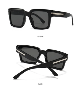 Detail view of square black sunglasses with silver metal accents from side and back