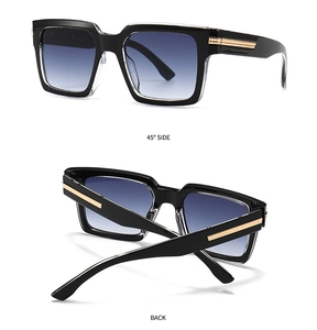 Detail of square sunglasses with black frames, blue gradient lenses and gold temple trim