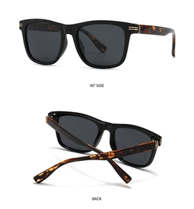 Detail view of square polarized sunglasses with tortoiseshell temples and gold metal accents