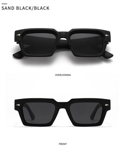 Detail view of sand black matte sunglasses with silver arrow rivets and polarized lenses