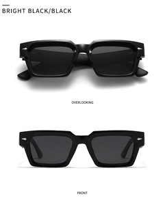 Macro detail of square black polarized sunglasses with silver diamond metal accents