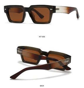 Detail view of vintage square sunglasses with green frames and interior temple size specs
