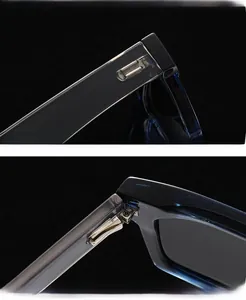 Macro shot of durable metal hinges and blue translucent frame on polarized sunglasses