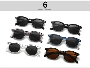 Group display of round polarized sunglasses with rivet detail in six assorted colors