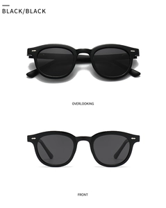 Vues frontale et supérieure de lunettes de soleil rondes noires avec rivets argentés